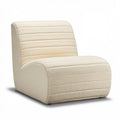 **Modern Curved Lounge Chair with Textured Fabric Upholstery**
